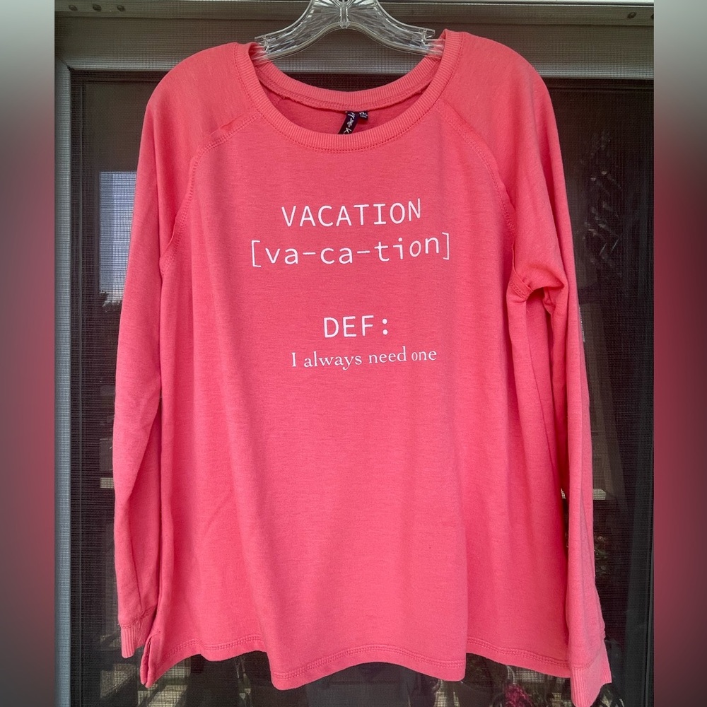 Casey Key Salmon pink “vacation definition I always need one” sweatshirt